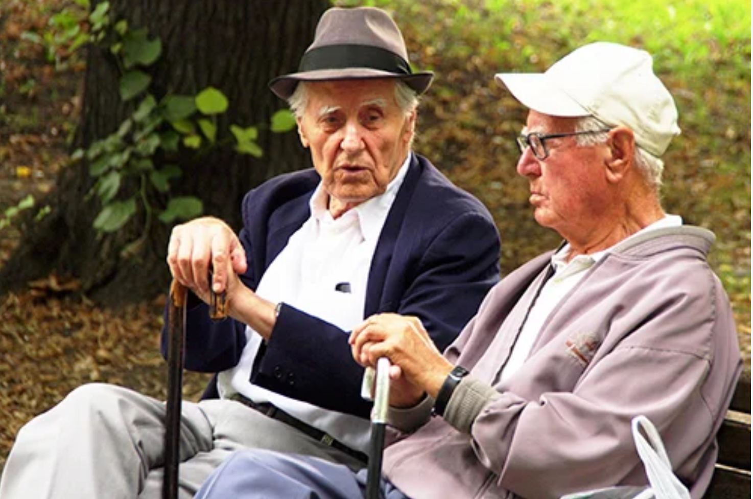 Sons of Thunder image of men talking on a park bench